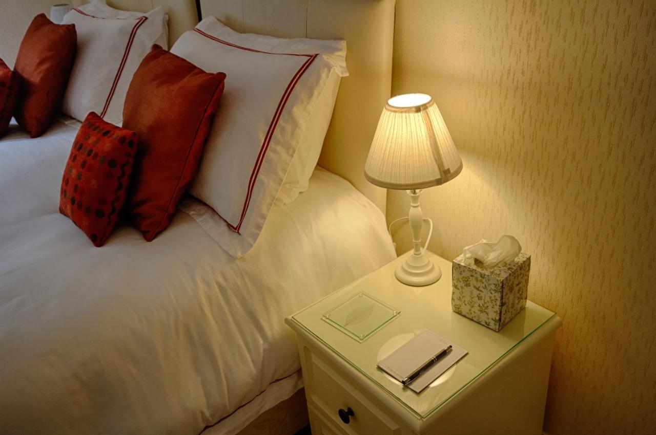 Holcombe House Guest House Ландъндо Екстериор снимка